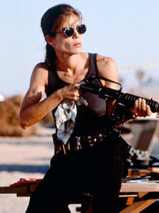 Sarah Connor cleaning rifle